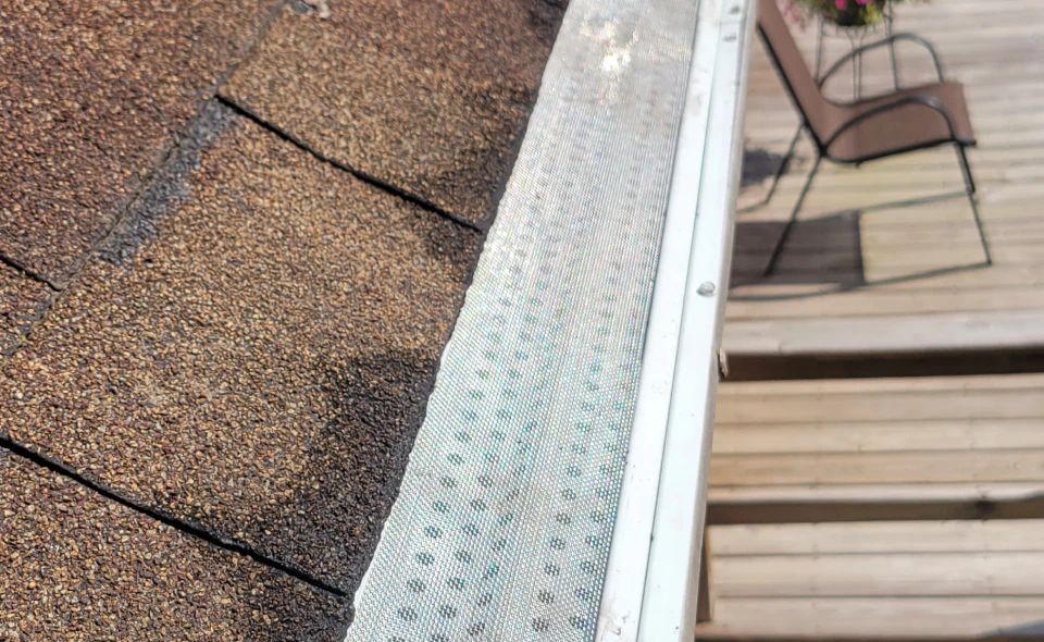 close up shot newly installed gutter guards